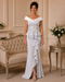Veni Infantino silver and ivory mother of the bride gown with beaded bodice, off-shoulder neckline and cascading crepe skirt