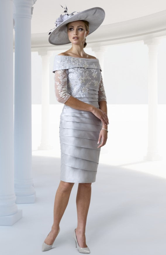 Elegant mother of the bride dress in silver with lace applique and Bardot necklline.