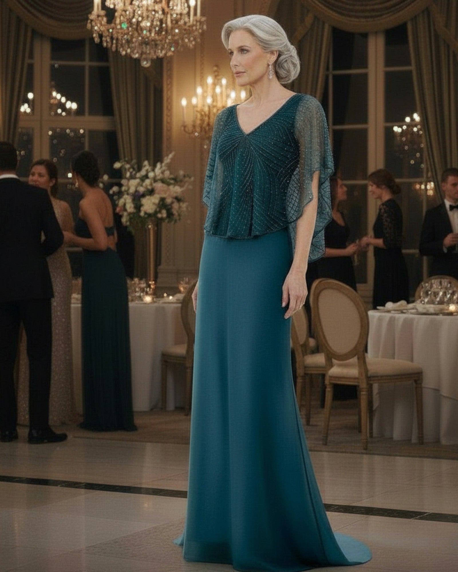 Deep jade long chiffon gown with a beaded cape overlay for mother of the groom.
