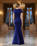 Back view of long cobalt blue gown for formal weddings.