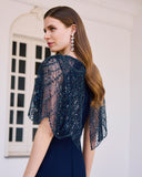 Back view of navy formal gown with beaded cape sleeves – Couture Club