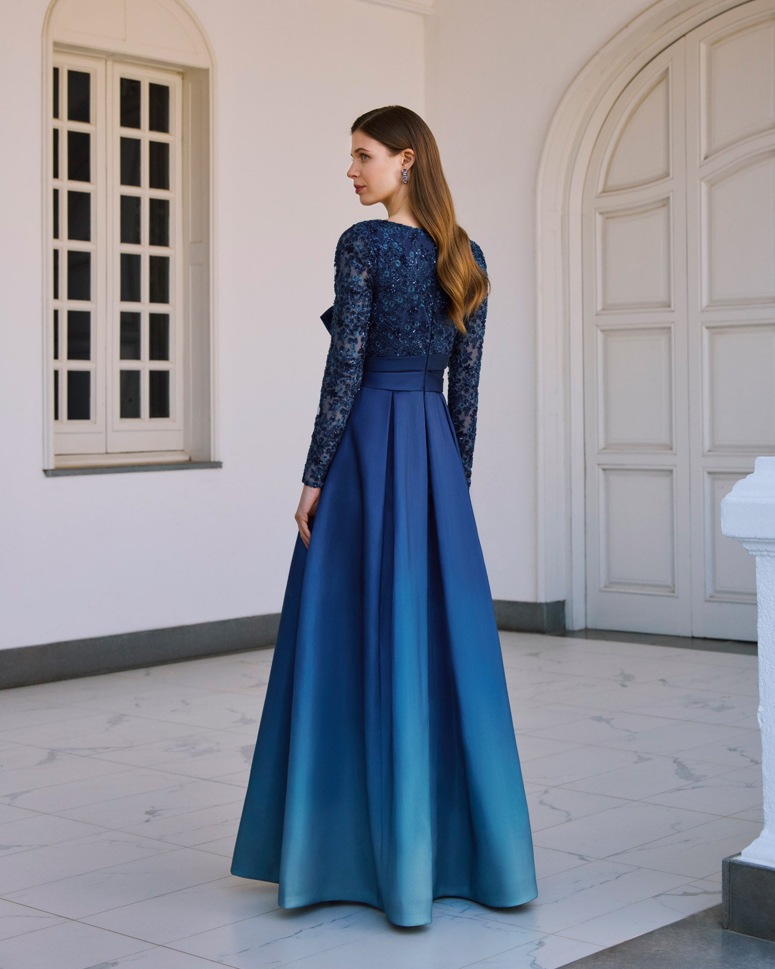 “Elegant beaded navy evening dress with V-neckline” back view