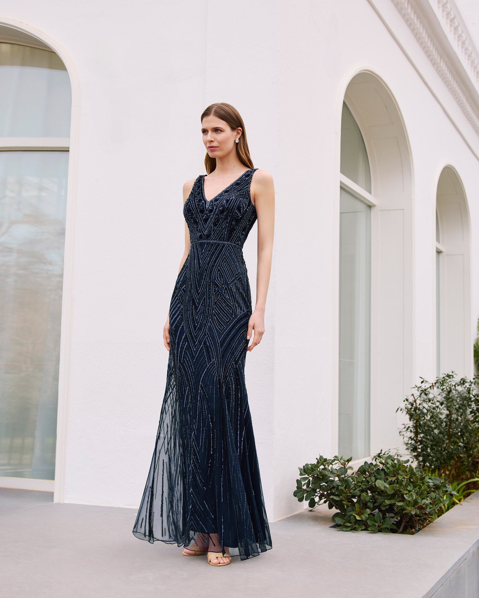 “Designer navy beaded gown for mother of the groom”