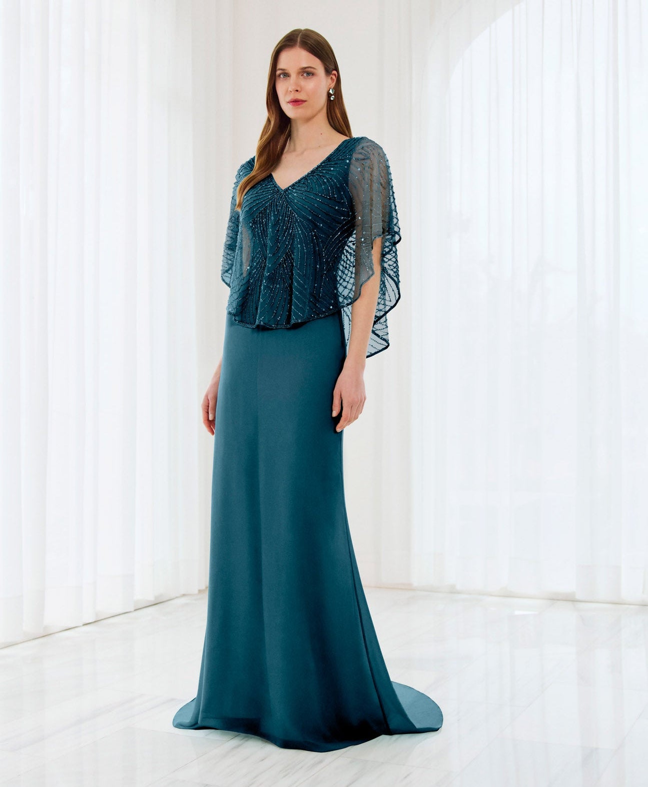 Front view of long deep jade mother of the bride gown.