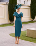 Couture Club teal middy dress with a organza shawl collar that covers the top of the arms and a beaded detail on the waistline.