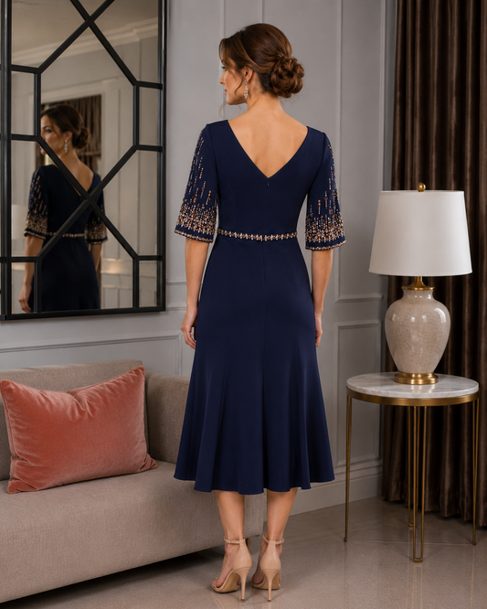 Navy occasion dress with bateau neckline, crystal embellished sleeves and flattering fit and flare skirt for mother of the groom