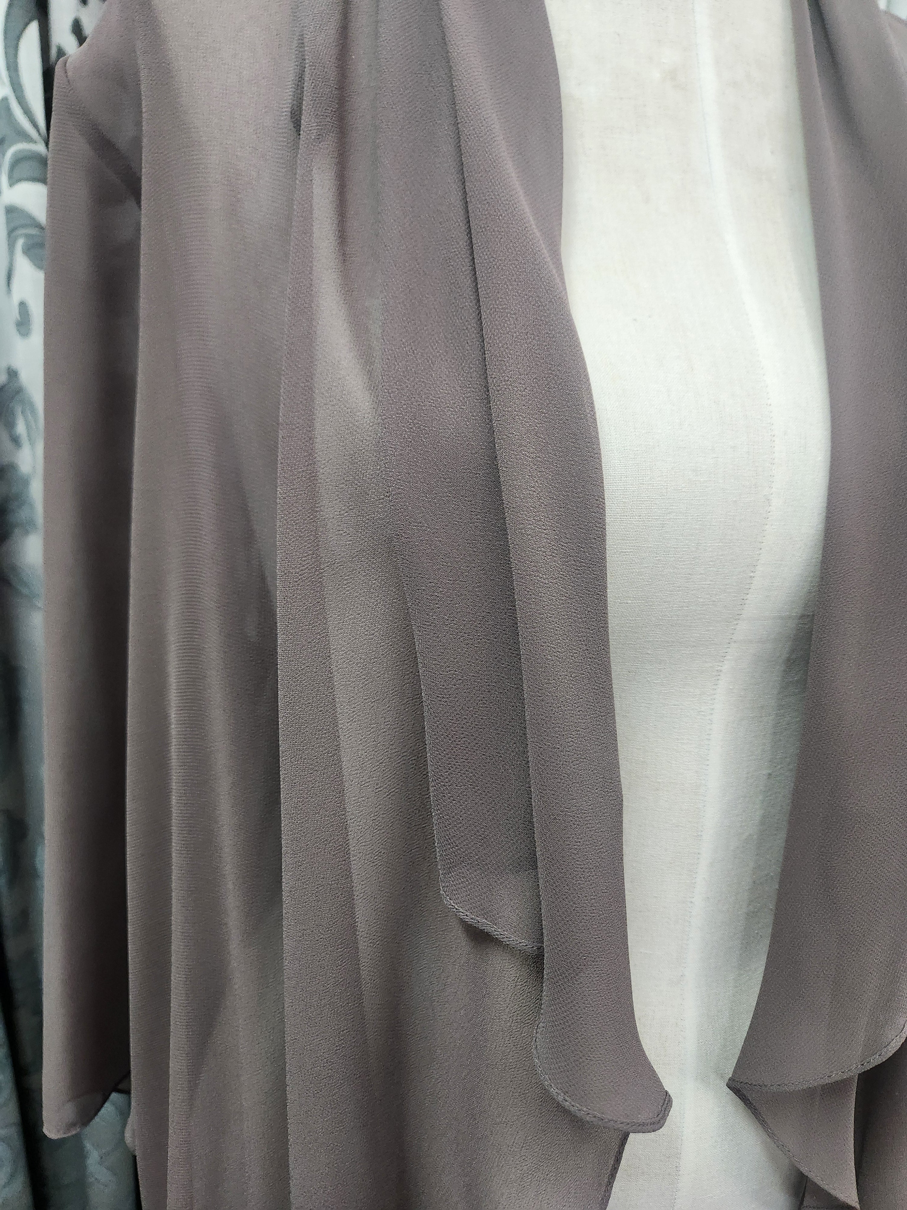 Close up of timber chiffon jacket showing the front drape