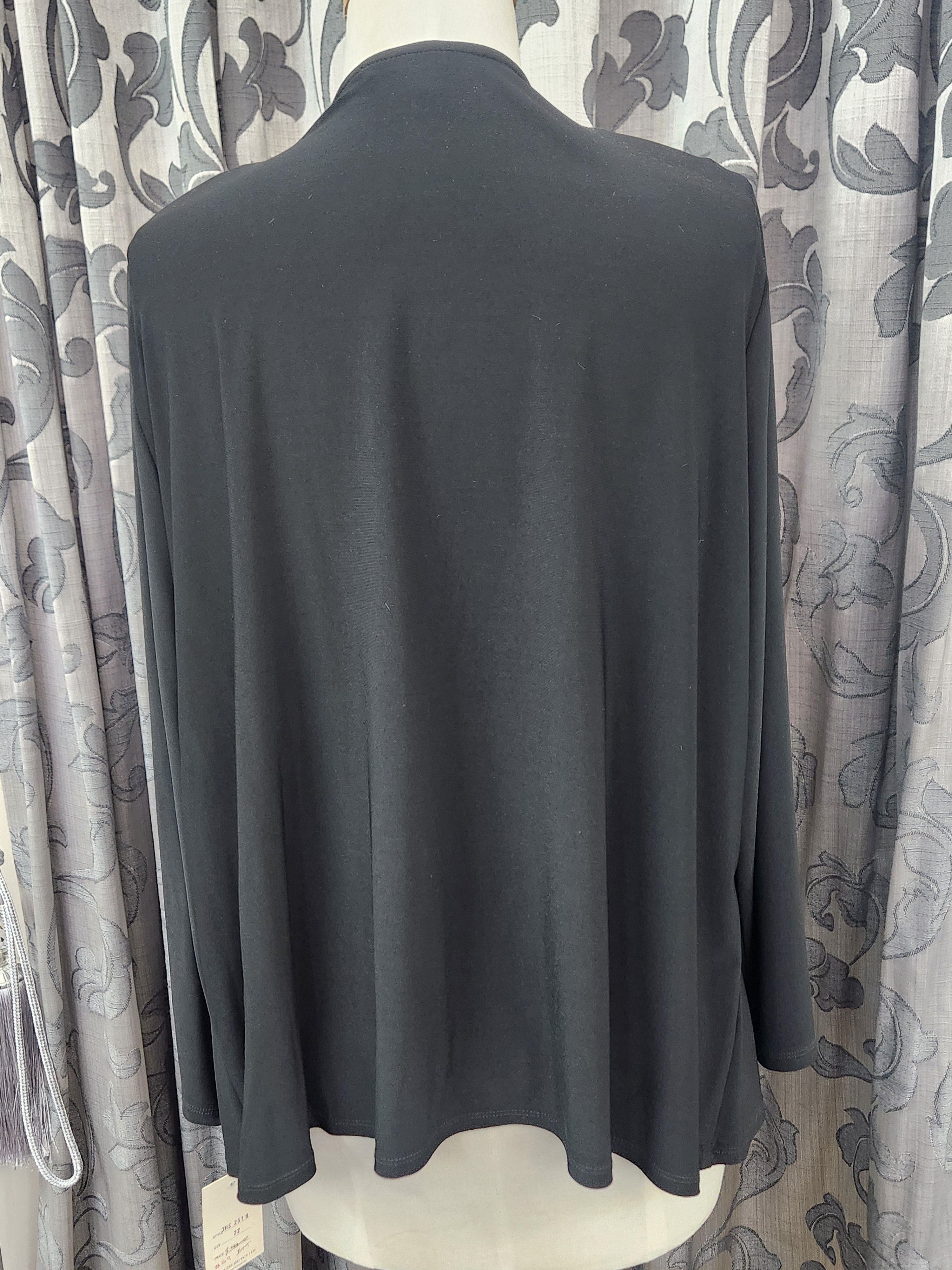 Back view of Black plus size jersey and satin cropped jacket