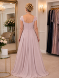 Back view of dusty pink designer mother of the bride gown with fitted silhouette, soft train and elegant formal occasionwear at Ever Elegant Melbourne