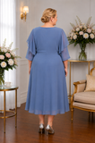 Back view of Lizabella 2983 plus size dusty blue chiffon dress with flowing skirt and sleeve coverage