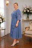 Plus size dusty blue chiffon occasion dress with beaded waist detail for wedding guests and mothers of the bride