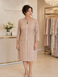 Taupe lace and crepe knee-length mother of the bride dress on a size 16 brunette model.