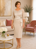 Champagne lace mother of the bride dress with illusion lace back and elegant three-quarter sleeves, styled on a mature size 16 model in a luxury boutique setting