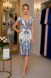 Blue and ivory floral mother of the bride dress with cap sleeves, fitted silhouette and knee-length skirt styled on a size 12–14 model in Ever Elegant Melbourne boutique