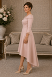 Side view of peach pink high-low occasion dress with sculpted portrait collar