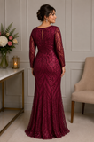 Back view of burgundy lace mother of the bride evening gown with sheer long sleeves on size 18 model – Veni Infantino formal dress at Ever Elegant Melbourne