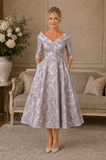 Couture Club pink and silver brocade mother of the bride dress with full tea-length skirt