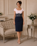 Soft pink and navy Condici mother of the bride dress with scoop neckline and tailored pencil skirt