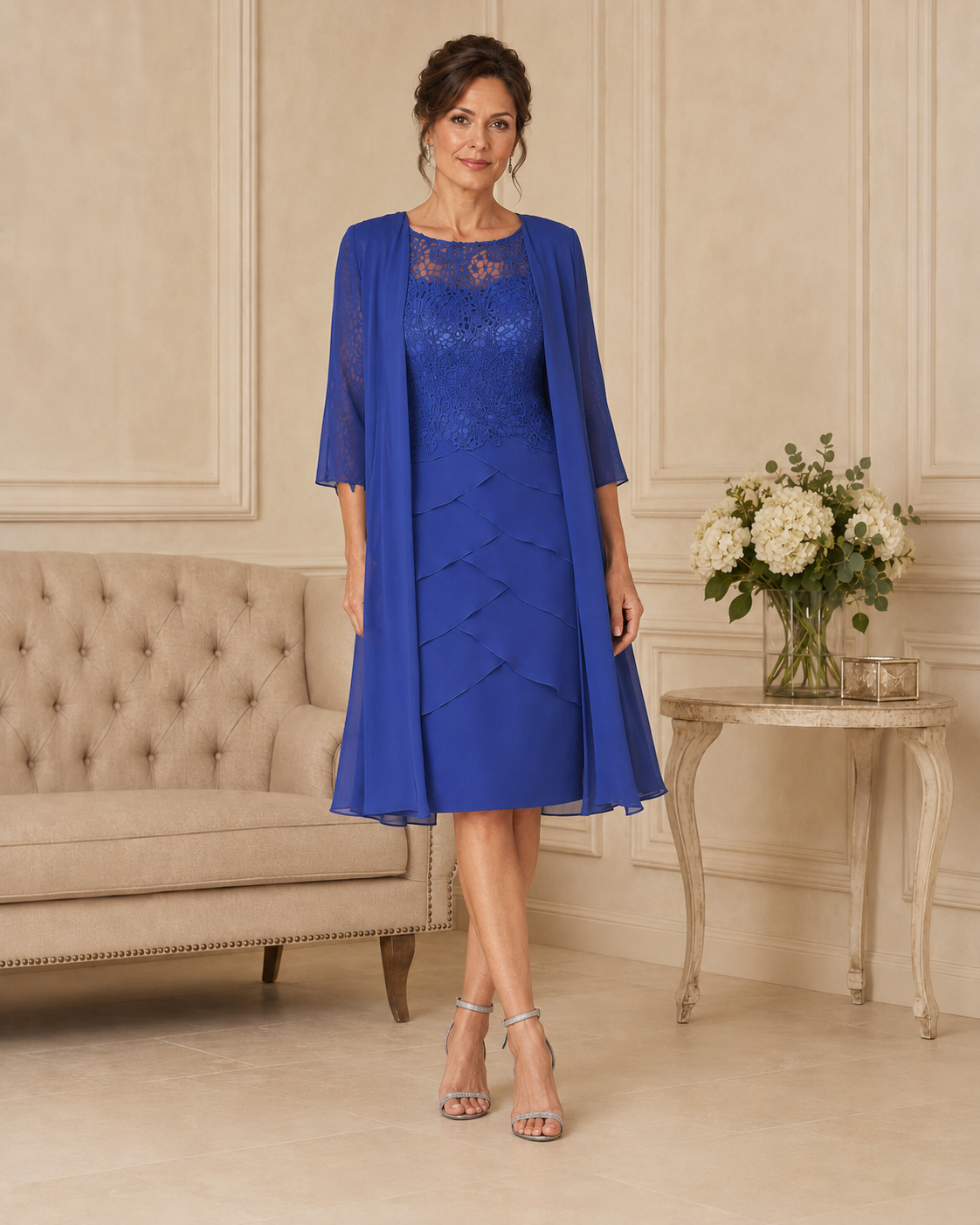 Royal blue occasion dress with matching sheer chiffon coat and lace bodice, shown from the front.