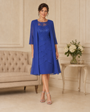 Royal blue occasion dress with matching sheer chiffon coat and lace bodice, shown from the front.