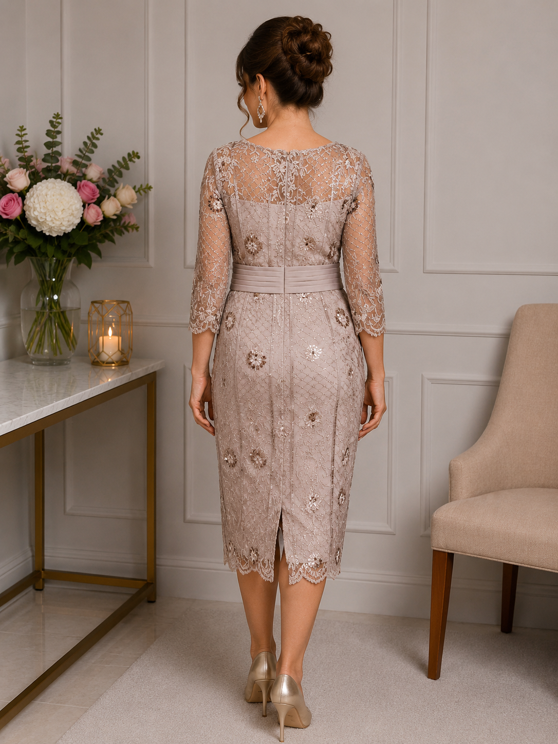 Back view of champagne embellished lace mother of the bride dress featuring sheer embroidered back and elegant fitted silhouette at Ever Elegant Melbourne.