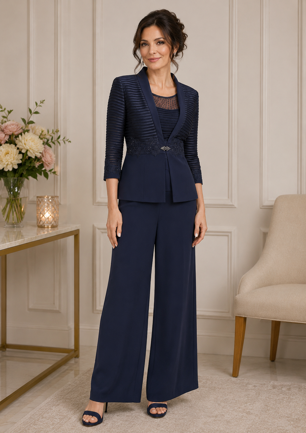 Veni Infantino navy mother of the bride pant suit on mature brunette model with elegant lace bodice and wide leg trousers at Ever Elegant Melbourne