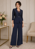 Veni Infantino navy mother of the bride pant suit on mature brunette model with elegant lace bodice and wide leg trousers at Ever Elegant Melbourne