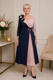 Veni Infantino navy and dusty pink mother of the bride dress with pleated skirt and 3/4 sleeves | Elegant wedding outfit Australia