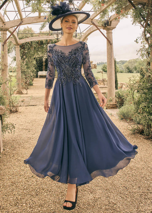 Light navy tea length mother of the bride dress with beaded lace bodice and chiffon skirt