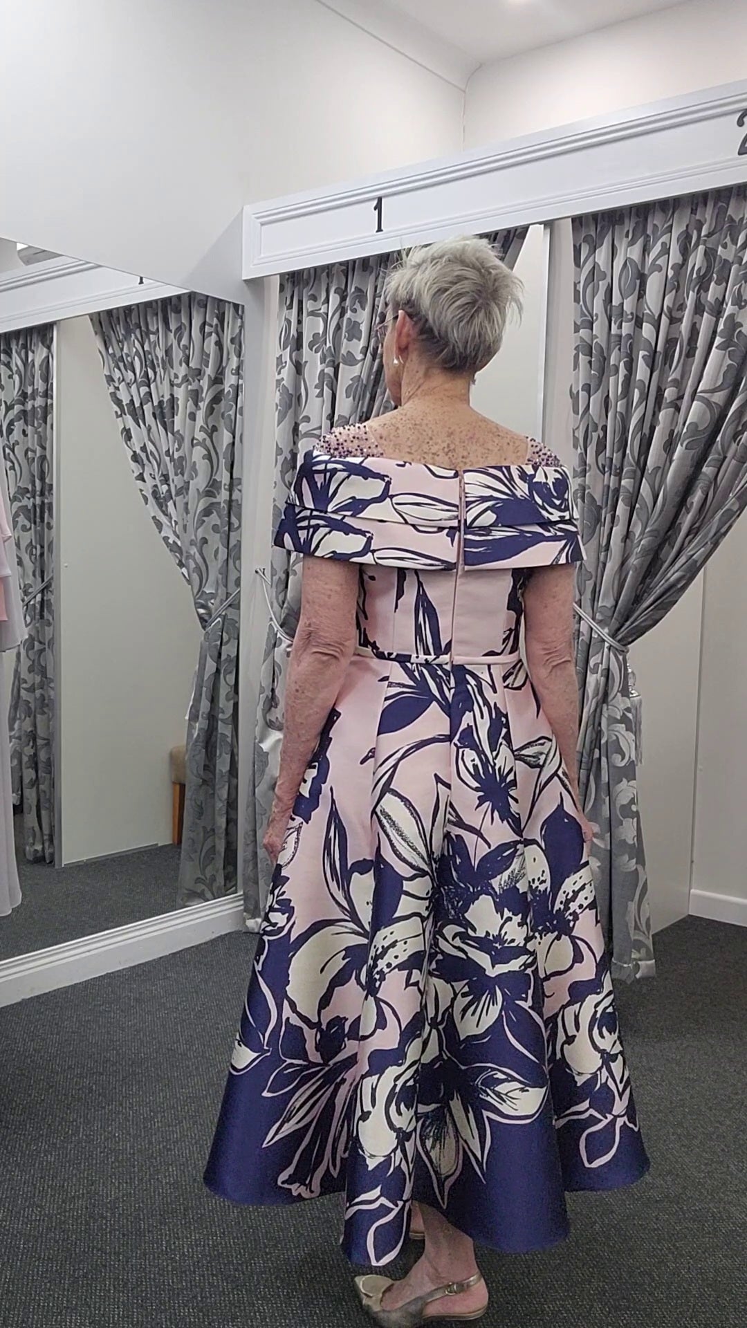 Back of Veni Infantino fit and flare dress 992575 in soft pink and navy  with beaded shoulder detailing
