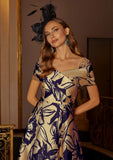 Close-up of beaded mesh shoulder detail and collar wrap on mother of the bride outfit