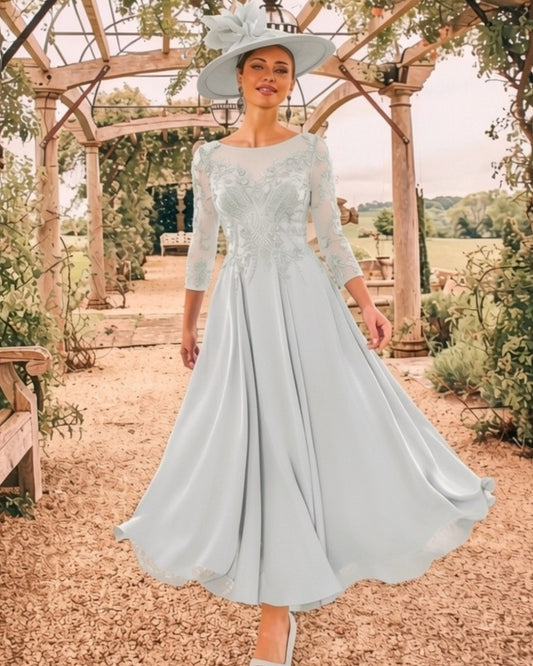 Silver tea length mother of the bride dress with beaded lace bodice and chiffon skirt