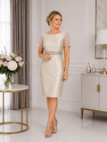 Gold mother of the groom outfit with short sleeves and waist band by Sonia Peña available in Australia at Ever Elegant