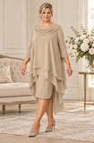 Coffee chiffon plus size dress with draped cowl neckline, three-quarter sleeves and cascading asymmetric layers, shown on a blonde model at Ever Elegant.