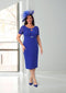 Royal blue pleated dress with empire waist – flattering plus-size outfit for mothers of the bride or groom.