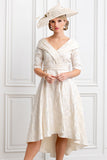 Large cream hatinator with bow and feather detail perfect mother of the bride, groom or racewear hat.