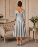 Stretch taffeta slate grey mother and grandmother of the bride dress, available at Ever Elegant Melbourne