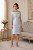 Elegant mother of the bride dress in silver with lace applique and Bardot necklline.