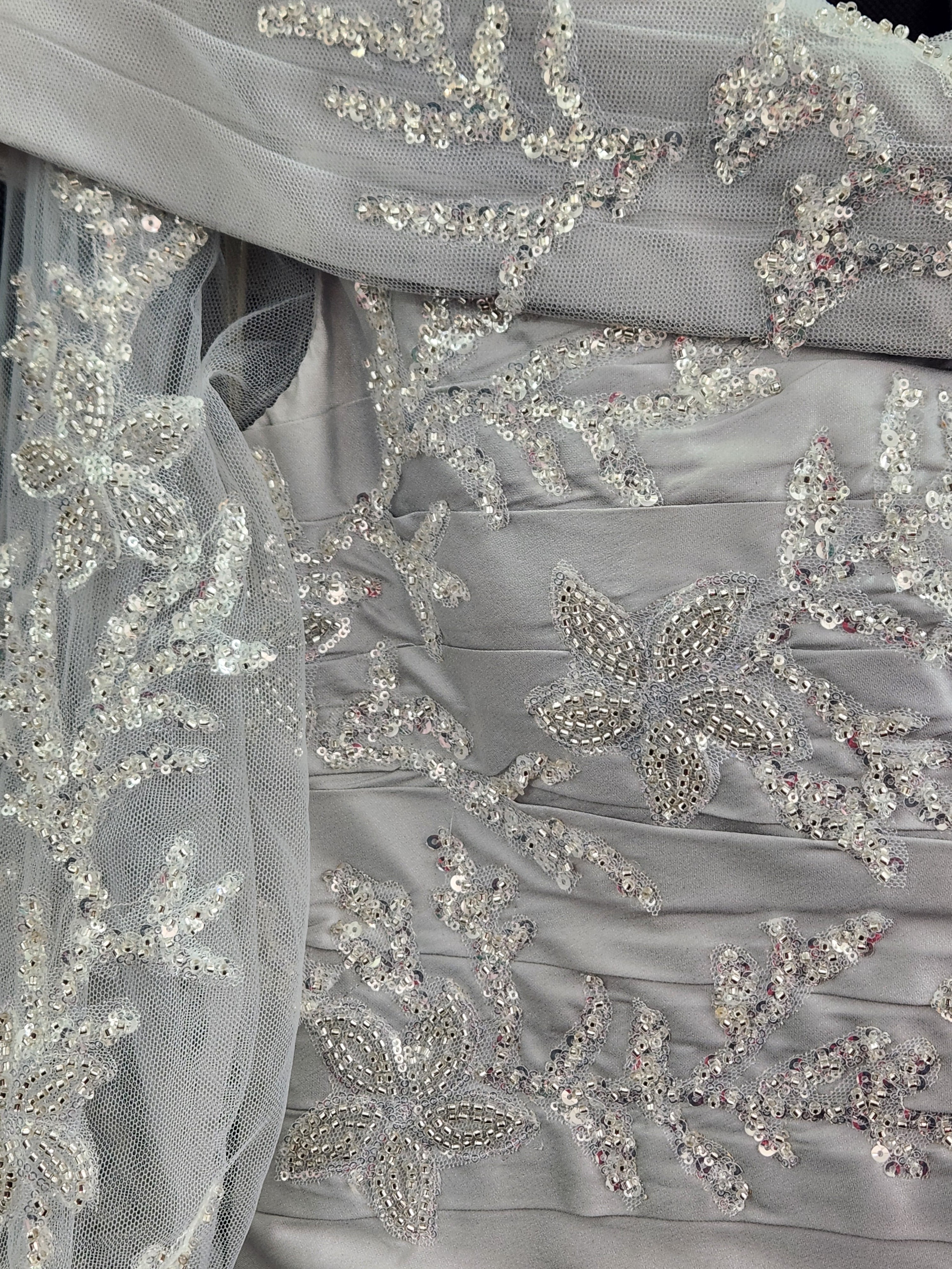 Close up of detail on the Irresistible Bardot neckline mother of the bride dress