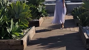 Video of the two piece mother of the bride skirt and top in lilac organza and with a brocade top.