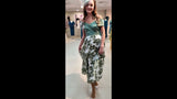 Video of full  Fil coupé botanical skirted dress in sage tones.