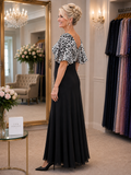 Side view of black and ivory Lewis Henry evening gown showing flattering empire waist and bias cut skirt