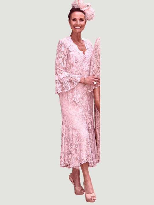 Mother of the bride outfit in soft pink lace with fluted sleeves