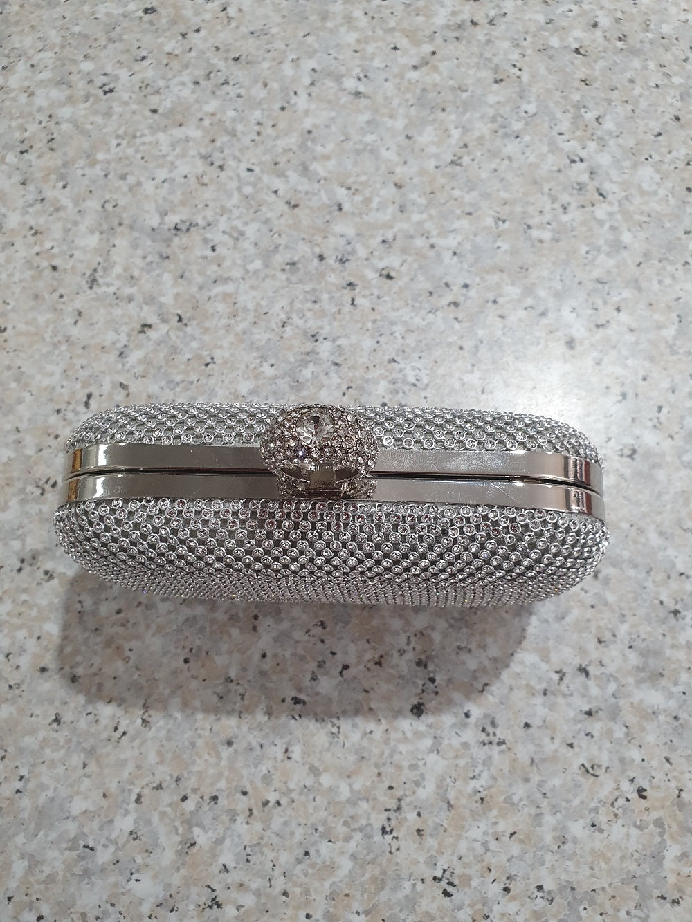 Our Accessories Collection Features The Diamante Clutch In Silver With our-accessories-collection-features-the-diamante-clutch-in-silver-with